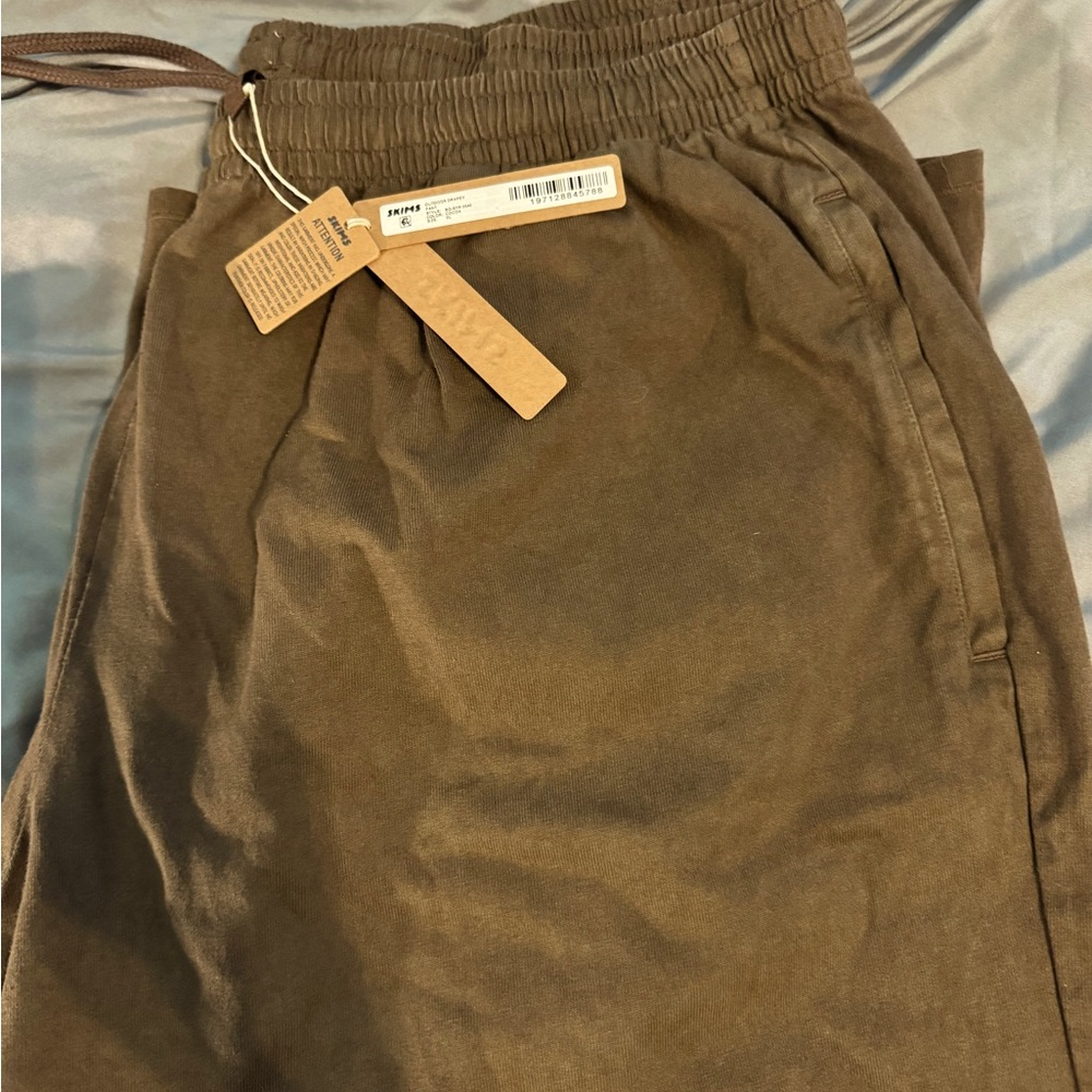 Skims Outdoor drapey pants.  Cocoa new with tags